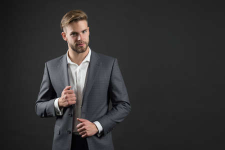 Businessman with bearded face and stylish hair. Manager in formal outfit.の写真素材