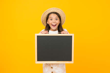 Little girl summer style hold blackboard announcement copy space, events coming concept