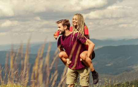 Two hearts full of love. Beautiful couple embracing landscape background. Couple in love summer...