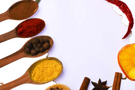 Composition of condiment on paper piece. Food art concept.