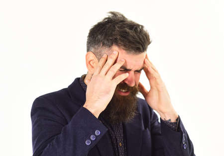 Brutal man suffers from ache. Stressed boss concept.の写真素材