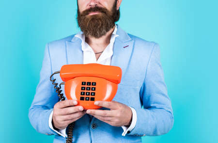 stay connected. customer service concept. Bearded man with telephone handset. business call concept....