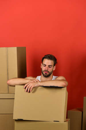 Macho with beard and concentrated face writing on clip boardの写真素材