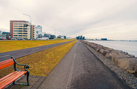 Reykjavik, Iceland - October 12, 2017: coastal landscape. Cross country traveling. Sea promenade roads on natural landscape. Enjoy traveling along sea side. Happiness is travelingのeditorial素材