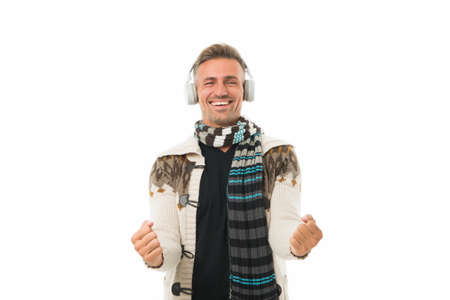 male preferences in music. dancing to his favorite song. happy mature unshaven man wear scarf. male...