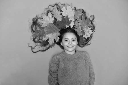 Fall season. Shampoo concept. Haircare tips add to fall routine. Little girl gorgeous long hair and...