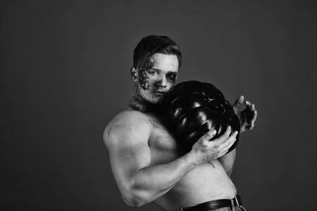 Monster with blood on face and chest demonstrates musclesの写真素材