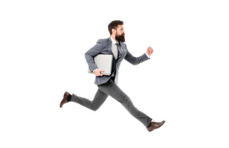 Towards success. Inspiring innovations. Businessman inspired guy feel powerful going to change world. Man inspired hold laptop while jump. Follow your dream. Keep moving. Inspired for start upの写真素材