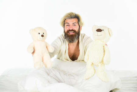 Good vibes. Playful and romantic. Man hug toy relaxing in bed. Imaginary friends. Strive to practice...