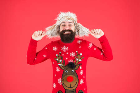 Be quick to get final best bits. Happy new year. Join party. Winter outfit. Christmas sweater. Hipster bearded man wear christmas jumper and hat. Christmas tradition. Christmas spirit and vibeの写真素材