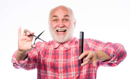 Barber work with sharp scissors. Man bearded handsome hairstylist barber use tool styling beard. Barbershop concept. Male haircut. Cut hair. Barber use professional equipment. Hairdresser serviceの写真素材