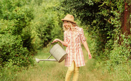 Watering tools. Measure soil water content temperature and salinity. Improve irrigation timing. Optimize water use. Watering plants in garden. Girl child hold watering can. Spring gardening checklistの写真素材