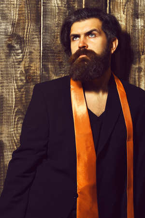 Brutal caucasian hipster have acid orange tie on suitの写真素材