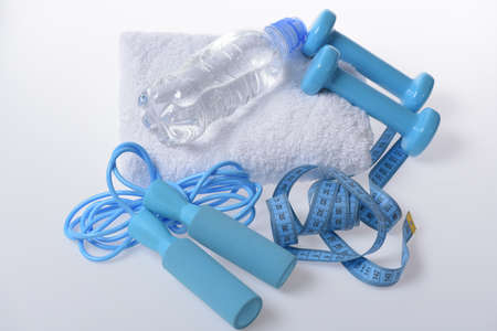 Health and fitness symbols. Jump rope, water bottle, barbells