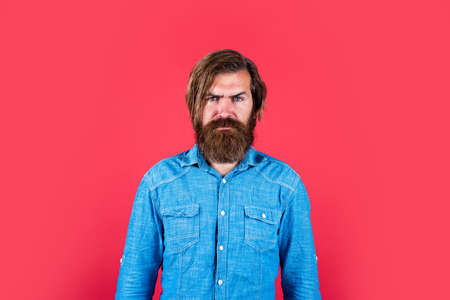 mature hipster with beard. brutal caucasian hipster with moustache. male barber care. serious bearded man. express human emotions. hair and beard care. confident and handsome brutal manの写真素材