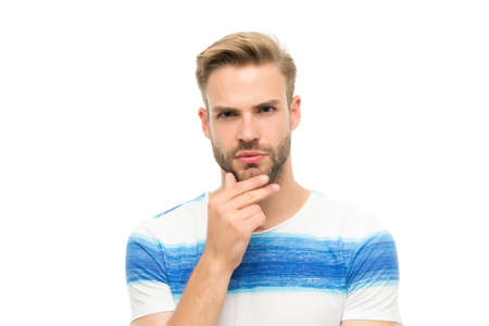 casual styled man with unshaven face and groomed hair thinking about something isolated on white background, beauty and fashionの写真素材