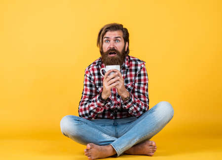 i like this. good morning to you. energetic warm beverage. need some coffee for inspiration. perfect start of the day. happy bearded man drinking morning coffee. man drink hot tea from cupの写真素材