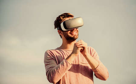 The future. sexy man sky background vr glasses. male reality in digital world. Use vr headset. macho...