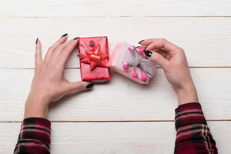 Present boxes for Christmas Eve. Holiday and surprise concept.の写真素材