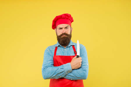 Chef using ceramic knife for cutting fruits and vegetablesの写真素材