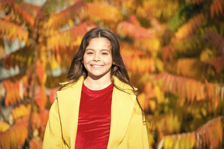 Autumn beauty. Girl smiling face walking in park. Upcoming events. Trendy girl in autumn coat....