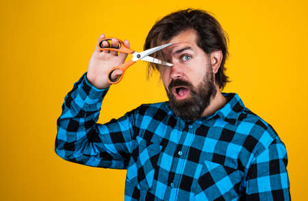 Try cut his hair. barber use scissors. trendy man use scissors for cutting hair. confident man at...