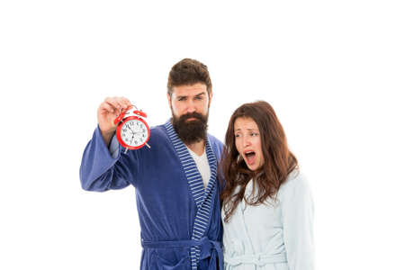 time management. Morning routine. Alarm clock ringing. tired family couple. sleepless man and woman...