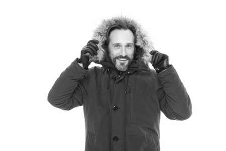 Feeling protected. Mature man in cold winter weather style. Man enjoying warmth and comfort. Casual coat for cold winter conditions. Handsome happy guy wearing faux fur hood. Winter collectionの写真素材