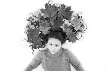 Organic mask. Haircare tips add to fall routine. Little girl gorgeous long hair and fallen maple...