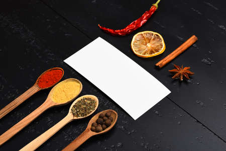 Wooden spoons with paprika, turmeric, herbs and pepperの写真素材