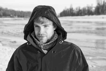 Comfortable outfit. Man warm jacket snowy nature background. Exploration of polar regions. Winter...