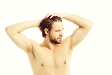 muscles man posing on white background.の写真素材