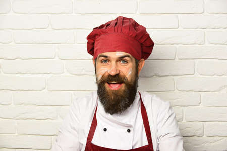 Man with happy face in white brick wall background.の写真素材