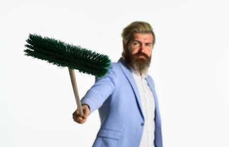 Global crisis and unemployment. Qualified. Personnel shifts. New responsibilities. Demotion concept. Crisis and unemployment. I agree to any work. Businessman hold broom. Financial crisis conceptの写真素材
