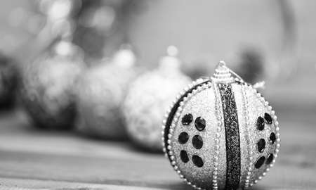 Winter holiday concept. Decorate christmas tree with traditional toys. Symbol of new year and christmas holidays. Various christmas decorations. Christmas balls decoration on blue wooden surfaceの写真素材