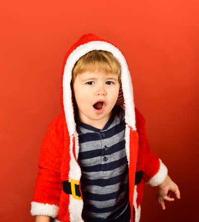 New year holiday concept. Kid with open mouth