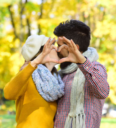 Close up of couple making heart shape with handsの写真素材