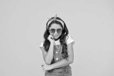 pin up kid. happy childrens day. cheerful vintage girl on yellow background. little beauty at...