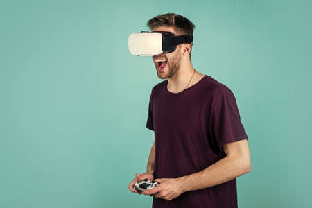New innovations. guy getting experience using VR-headset glasses. man in virtual reality goggles....