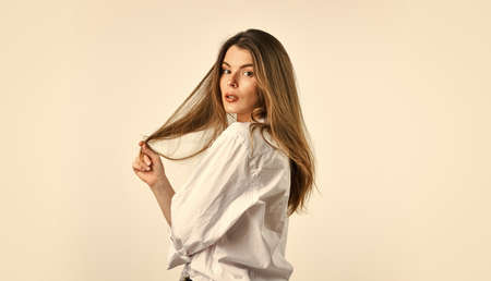 confident businesswoman. woman with sensual look. fashion model looking elegant. female wear office shirt. beauty and fashion. girl with natural makeup. sexy woman isolated on whiteの写真素材