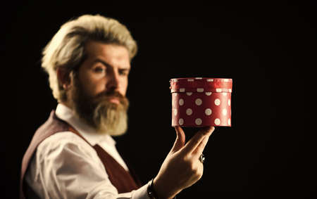perfect gift. shopping on holiday. black friday. brutal man isolated on black. Proposal. happy...
