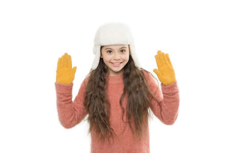 time for knitwear. kid fashion store. winter time shopping. favorite knitwear. yarn and fur. its sweater weather. white christmas. small cheerful girl isolated on white. happy new year holidaysの写真素材