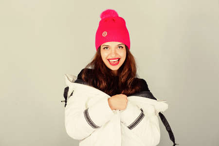 Girl wear white jacket. Fancy stylish winter clothes. Jacket has extra insulation and slightly...
