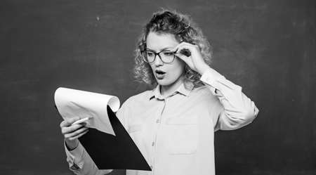 Read impressing resume. Read personal profile. Tutor checking homework. Estimate essay of...