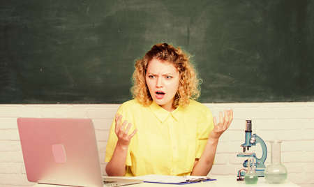 Teacher stressful occupation. Mental health and stress influence. Girl emotional with laptop and...