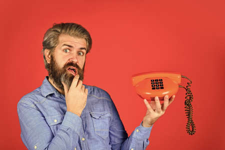Cold Calling Scripts. Outdated technology. Manager phone dialog communication. Answering machine. Bearded man phone conversation. Call me. Successful negotiations. Retro phone. Sales scriptの写真素材