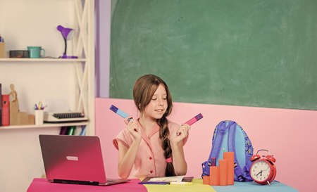 drawing lesson. knowledge day. childhood study online. small girl pupil with laptop. Draw picture...