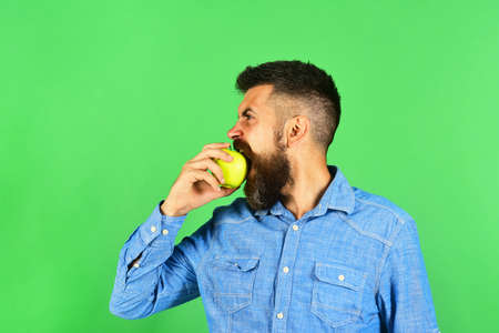 Gardening and fall crops concept. Farmer with hungry faceの写真素材