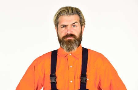 Mechanic perform technical work. Bearded mature man in uniform. Reputation of excellent worker. Skillful worker. Electrician plumber handyman. Repairman. Construction worker. Renovation conceptの写真素材