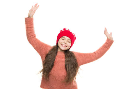 happy little girl loves winter. finally winter holidays. enjoy christmas vacation. good mood in any weather. warm apparel for cold weather. childhood happiness and joy. knitwear fashionの写真素材